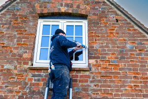 white upvc flush window being installed