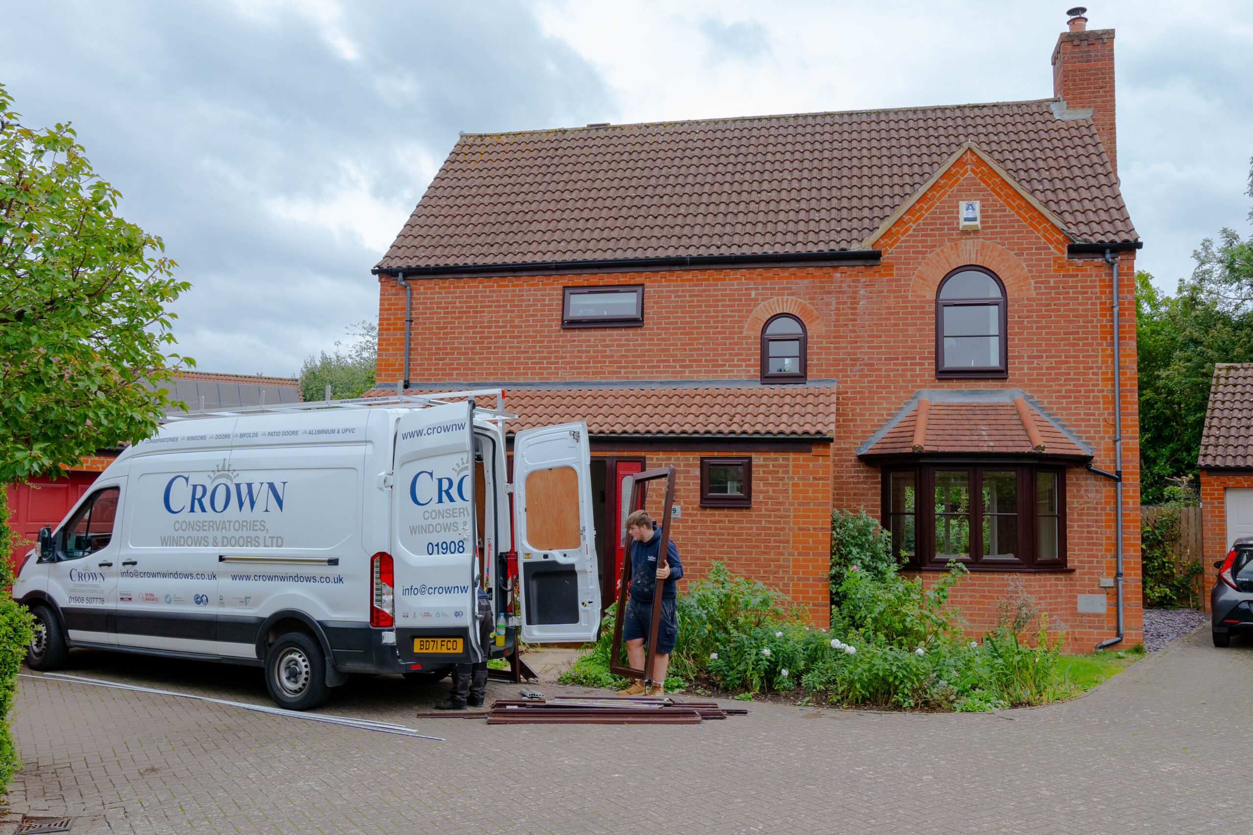 crown van outside property scaled 1