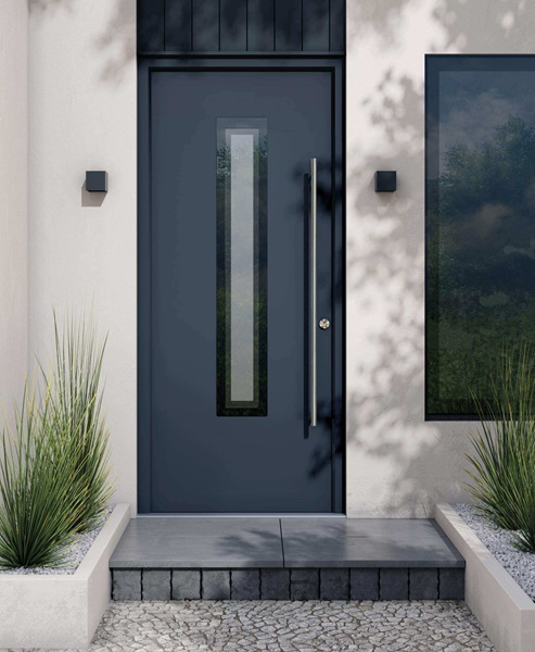 A dark grey composite door with a long vertical glass insert and a sleek, modern handle, set against a minimalist exterior.